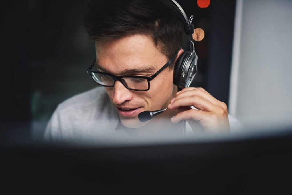 male rd tax specialist advising clients over the phone 