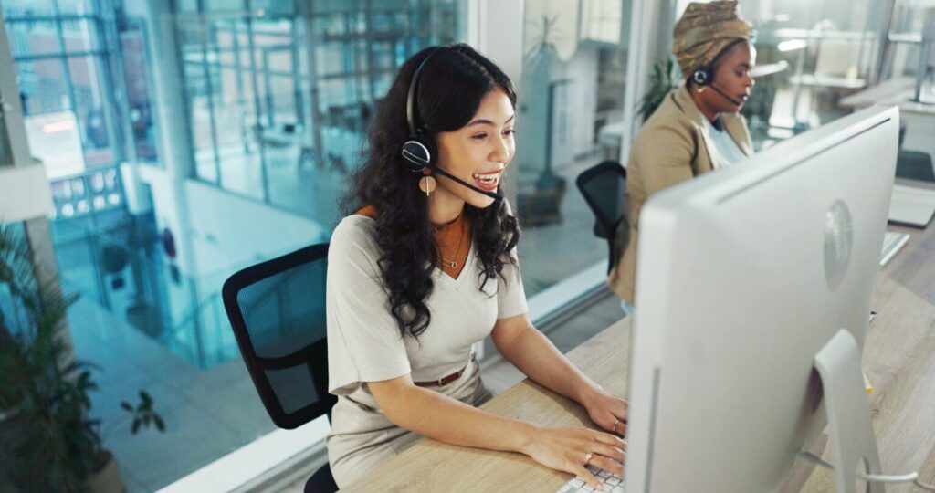 female rd tax specialist working at desk in corporate office